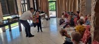 Przedszkolaki na koncercie orkiestry i zabawach w GOKu